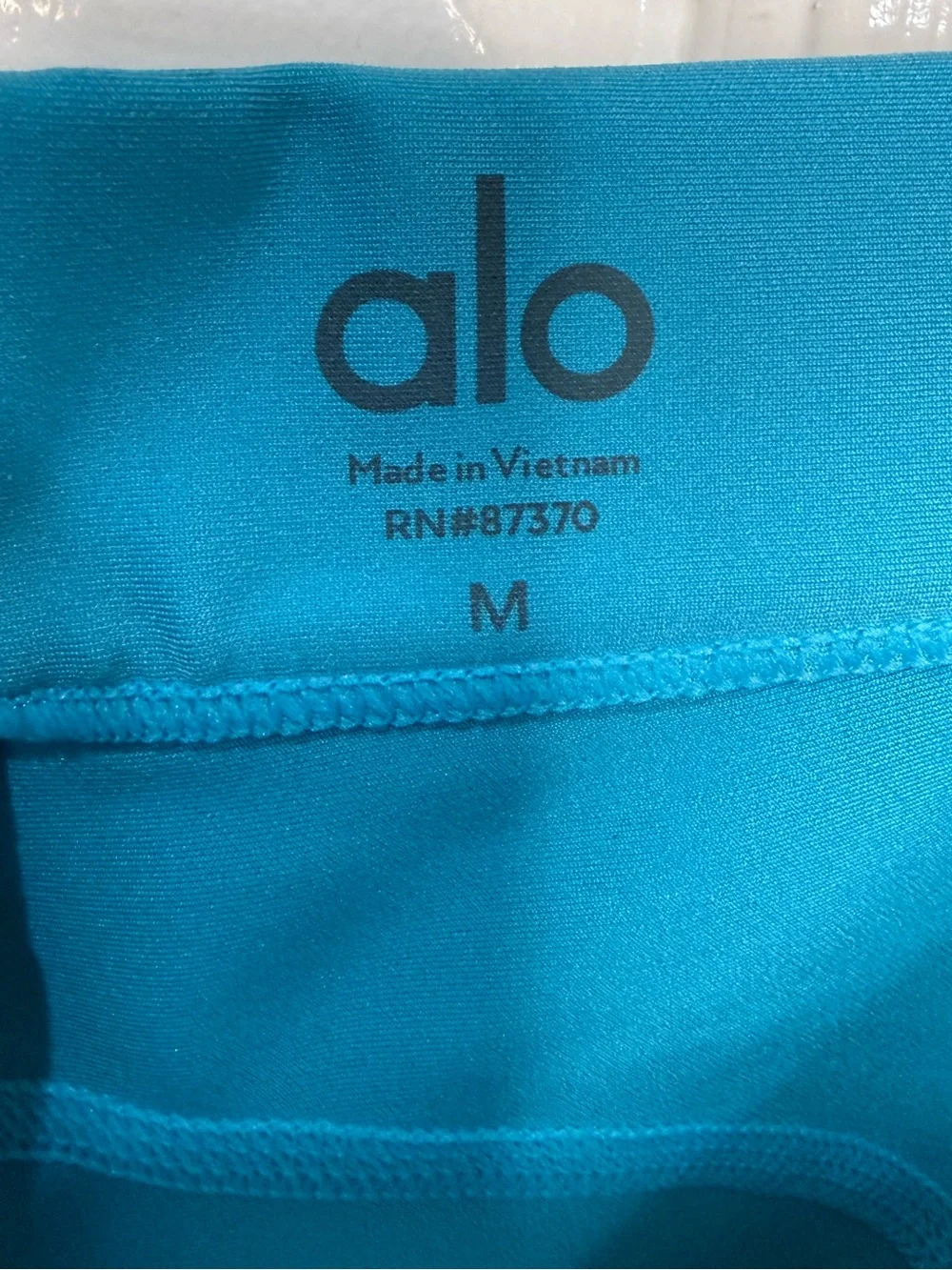 ALO Yoga Bright Teal Performance Leggings - size Medium